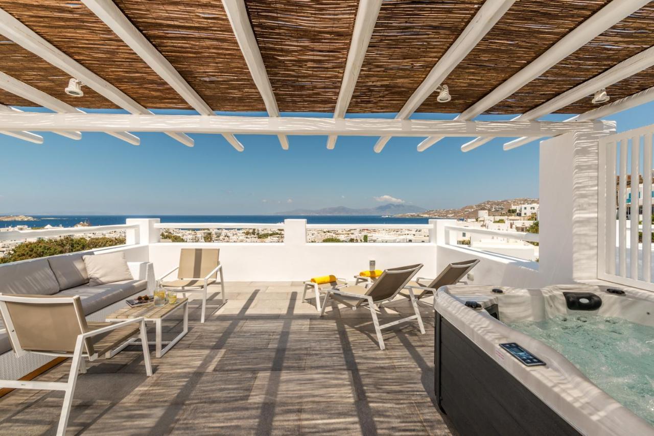 Suite Grand Terrace con vistas panorámicas al mar y bañera de hidromasaje al aire libre