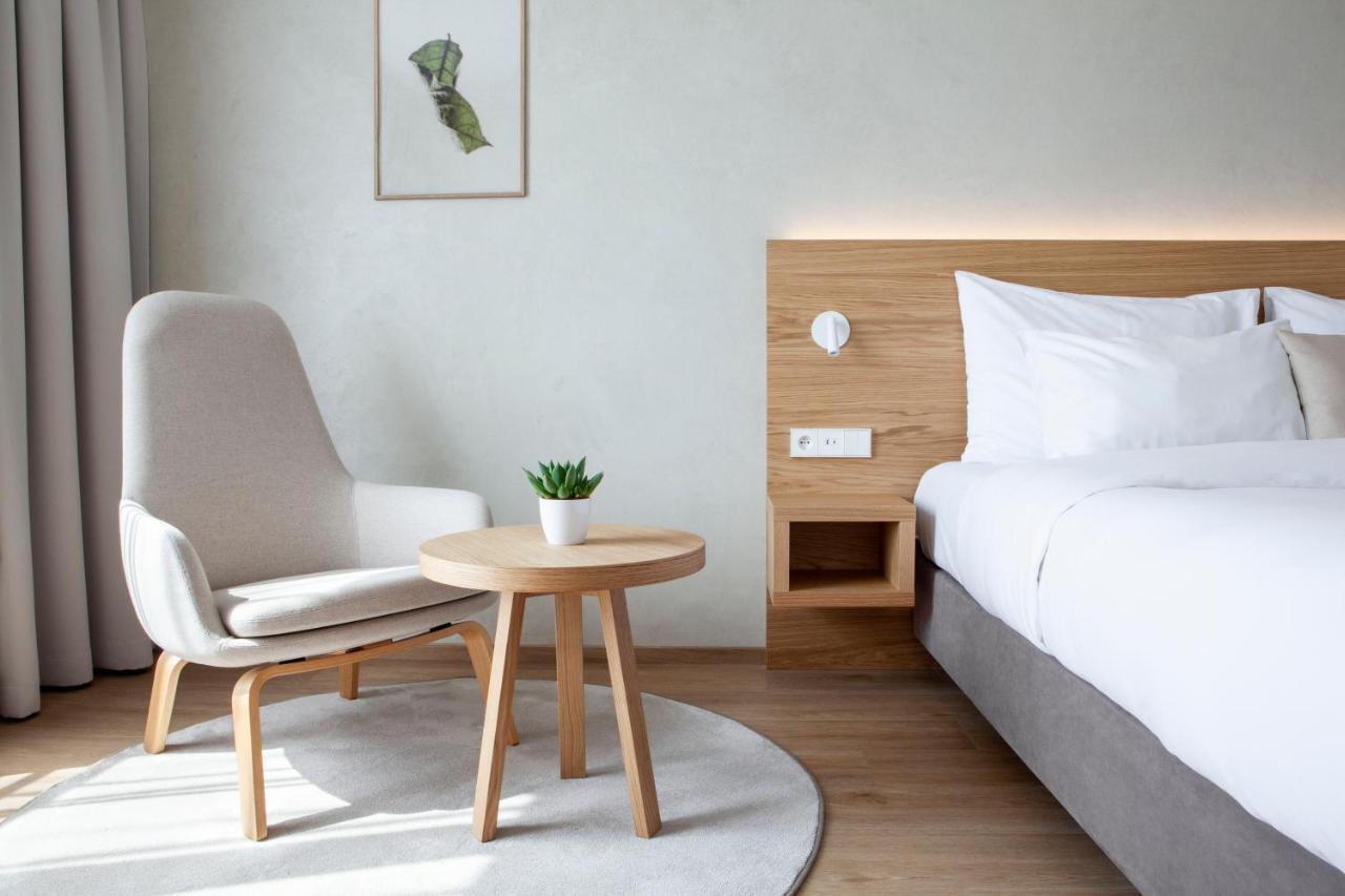 Habitación Doble Premium con cama grande y balcón