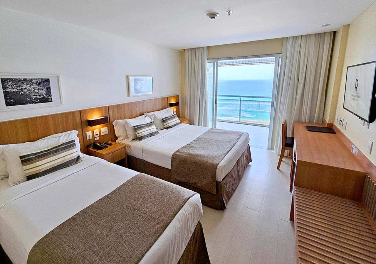 Habitación Triple de lujo con balcón y vistas frontales al mar