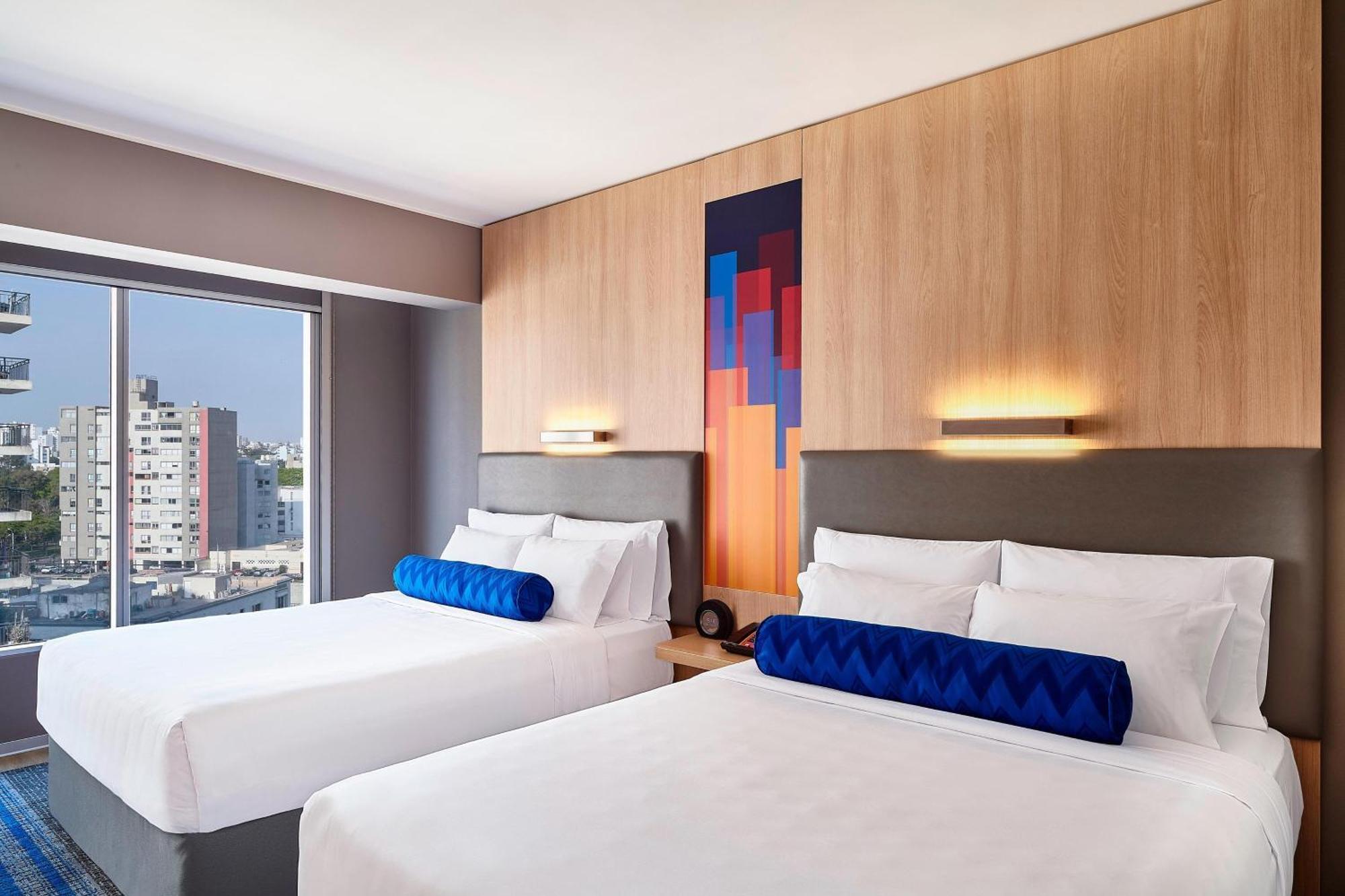 Breezy Room, Larger Guest Room, 2 Queen,1643202570:JPEG