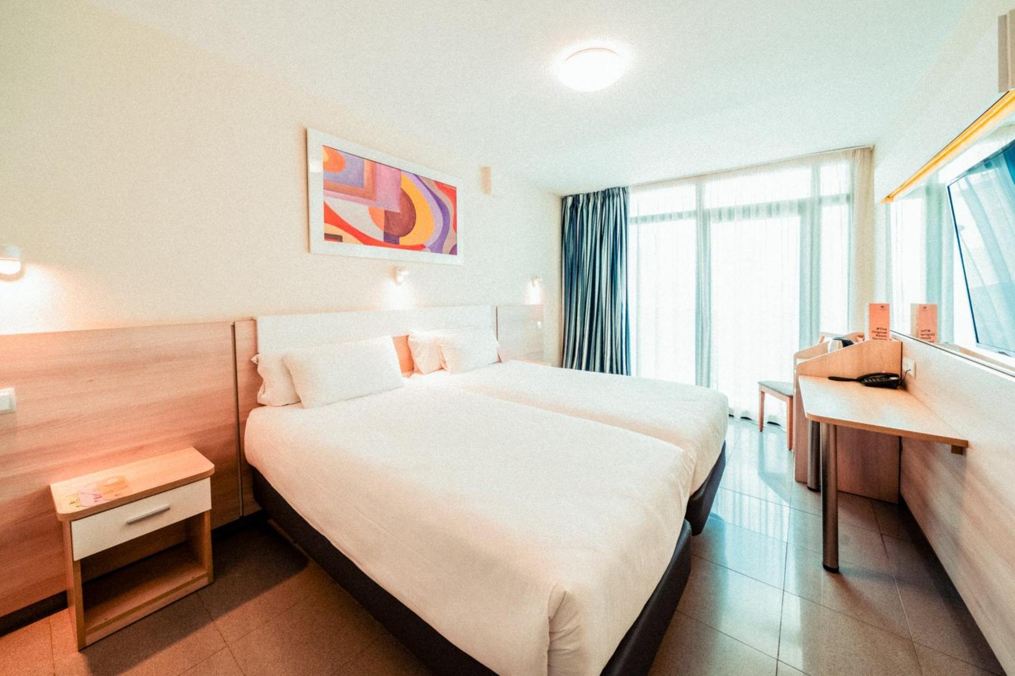 Habitación con balcón y 2 camas (2 adultos)