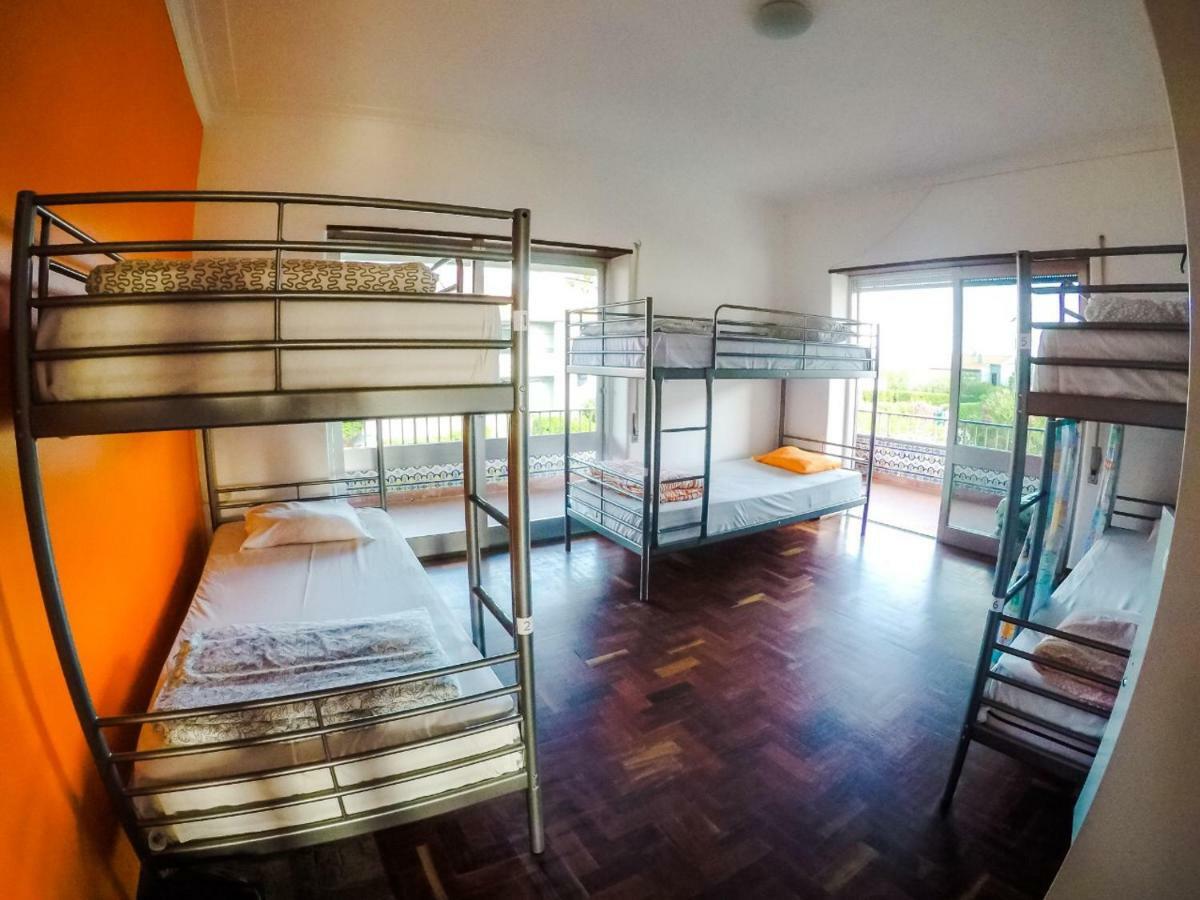 Cama en habitación compartida de 6 camas