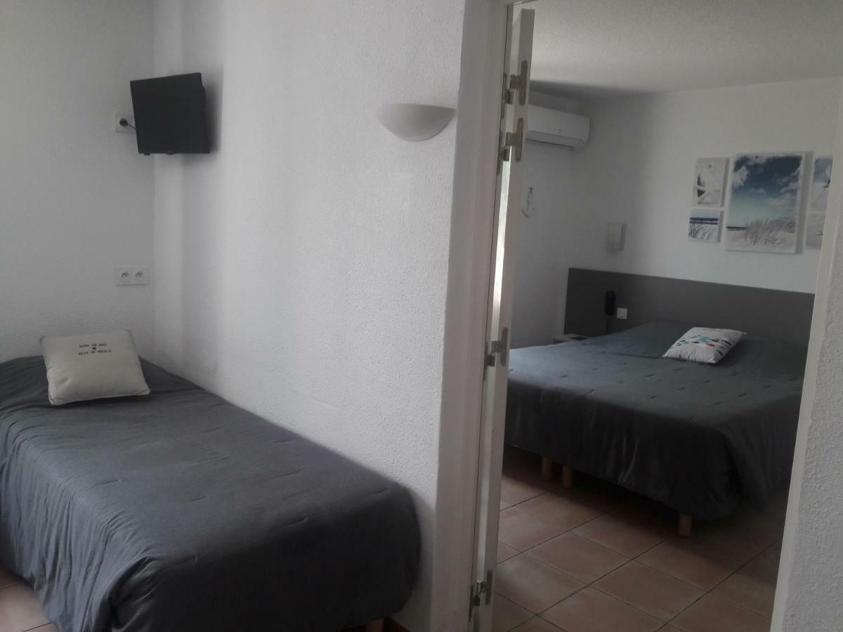 2 habitaciones comunicadas (5 personas)