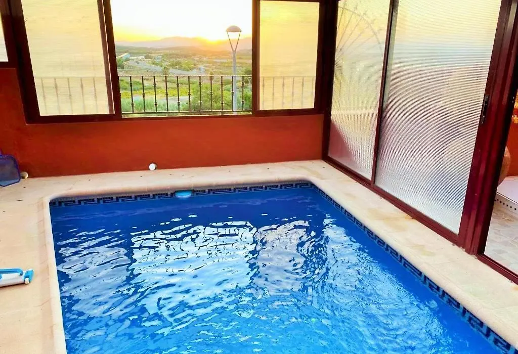 Vivienda de estilo rústico con piscina LA GRANÁ-1