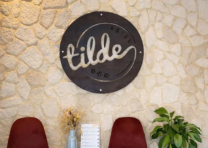  Tilde